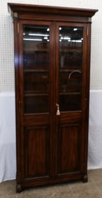 mahogany glass door cabinet by Theodore Alexander