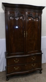 carved mahogany tv cabinet by Henry Dunn