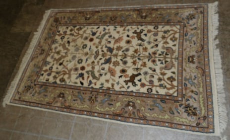 4' 1" by 6' 4" handmade Oriental rug
