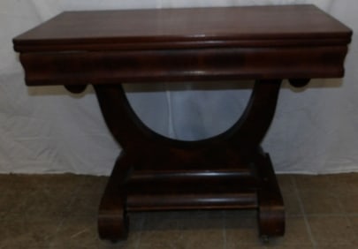 19th century mahogany Empire fold over top game table