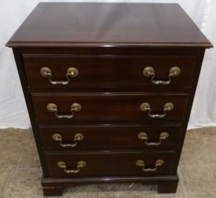 mahogany four drawer night stand by Davis Cabinet Company