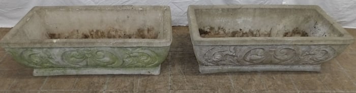 pair of cast concrete planters