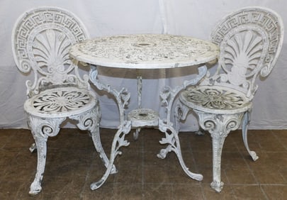 painted cast aluminum table and two chairs