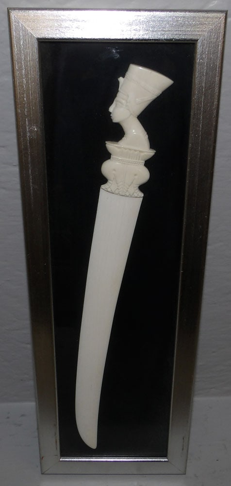 Bone Letter Opener with Carved Face Handle: Bone Letter Opener with Carved Face Handle. "ALL DESCRIPTIONS AND ANY CONDITION STATEMENT GIVEN BY LANGSTON AUCTION GALLERY ARE STRICTLY OPINIONS AND LANGSTON'S SHALL HAVE NO RESPONSIBILITY FOR ERRORS