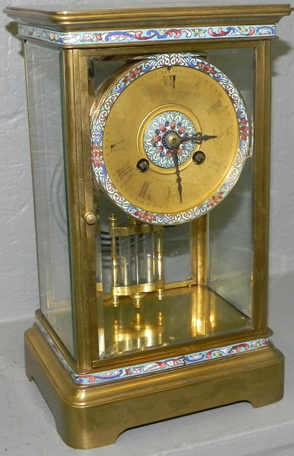 Crystal Regulator clock with enamel decorations.: Crystal Regulator clock with enamel decorations. 10 1/2" tall.