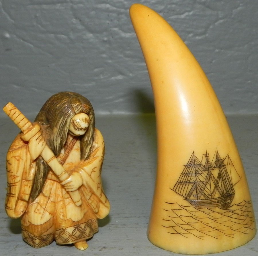 Bone ivory dbl face netsuke & small scrimshaw.: Bone ivory double face netsuke and a small scrimshaw.