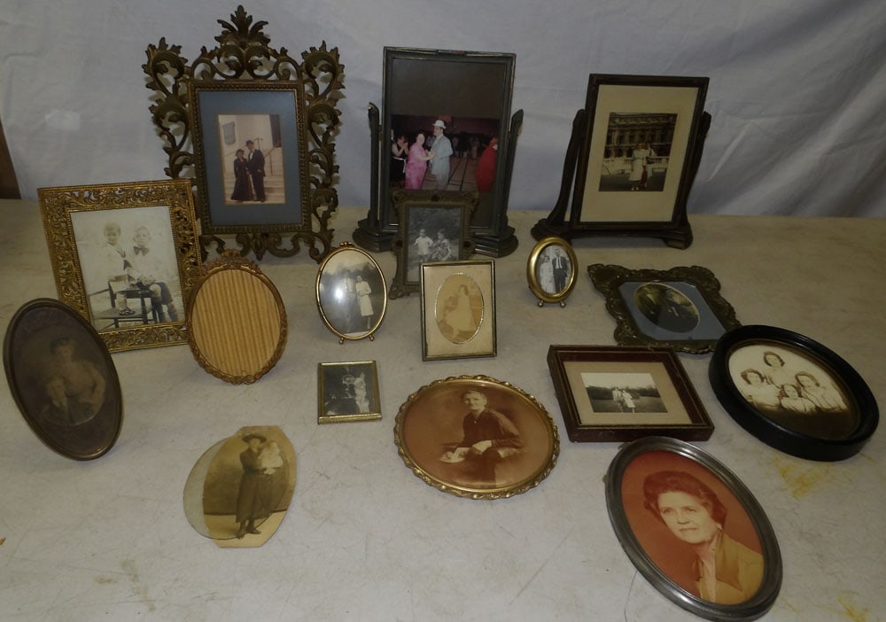 Lot of Vintage Photos & Photo Frames: Lot of Vintage Photos & Photo Frames. Up to 13" H 9 1/2" W 3 1/2" D ALL DESCRIPTIONS AND ANY CONDITION STATEMENT GIVEN BY LANGSTON AUCTION GALLERY ARE STRICTLY OPINIONS AND LANGSTON'S SHALL HAVE NO RE