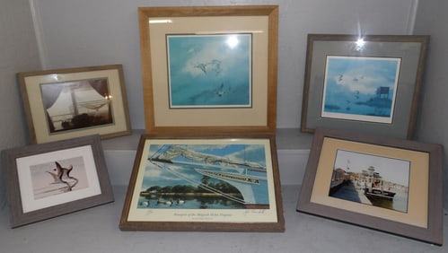 lot of framed photos and framed prints