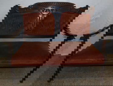 antique carved mahogany and gargoyle head arm Victorian settee