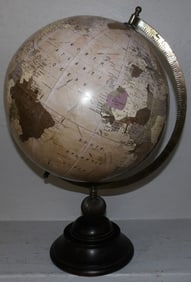 world globe on brass and wood stand