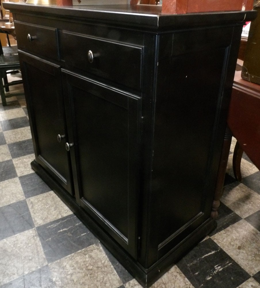 modern black lacquered cabinet : modern black lacquered cabinet . 38 1/4" H 42" W 18 3/4" D ALL DESCRIPTIONS AND ANY CONDITION STATEMENT GIVEN BY LANGSTON AUCTION GALLERY ARE STRICTLY OPINIONS AND LANGSTON'S SHALL HAVE NO RESPONSIBIL