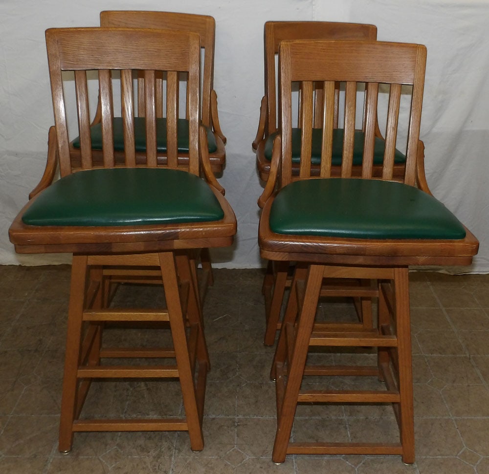 set of four Mission style oak swivel bar stools  (1 of 3)