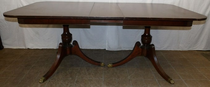 mahogany two pedestal dining table with one leaf