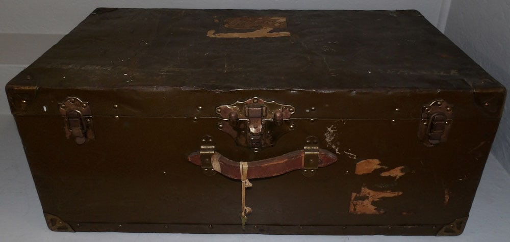 vintage metal bound foot locker : vintage metal bound foot locker . 12 1/4" H 30 1/4" W 16 1/4" D ALL DESCRIPTIONS AND ANY CONDITION STATEMENT GIVEN BY LANGSTON AUCTION GALLERY ARE STRICTLY OPINIONS AND LANGSTON'S SHALL HAVE NO RESPON