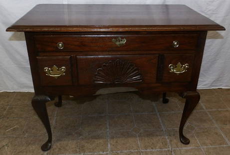 oak Queen Anne style lowboy by Cushman Colonial : oak Queen Anne style lowboy by Cushman Colonial . 24" H 32" W 18 1/4" D ALL DESCRIPTIONS AND ANY CONDITION STATEMENT GIVEN BY LANGSTON AUCTION GALLERY ARE STRICTLY OPINIONS AND LANGSTON'S SHALL HAVE N