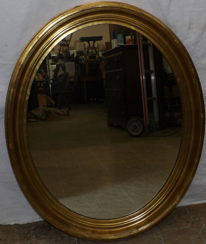 gilded oval frame mirror  (1 of 4)