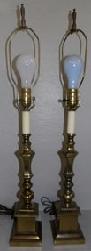 pair of gilded metal lamps