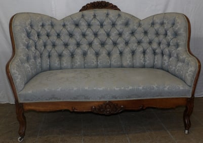antique walnut and upholstered Victorian love seat