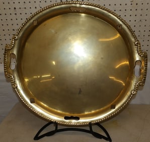 brass serving tray on metal stand