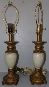pair of painted resin lamps