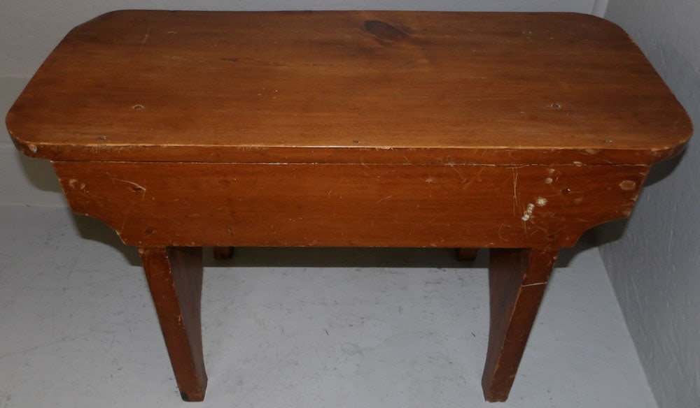 pine bench : pine bench . 18 3/4" H 28" W 11 3/4" D ALL DESCRIPTIONS AND ANY CONDITION STATEMENT GIVEN BY LANGSTON AUCTION GALLERY ARE STRICTLY OPINIONS AND LANGSTON'S SHALL HAVE NO RESPONSIBILITY FOR ERRORS OR OM