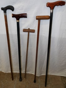 5 vintage wood and metal walking sticks