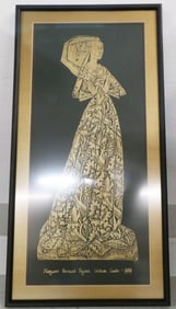 framed brass rubbing behind glass