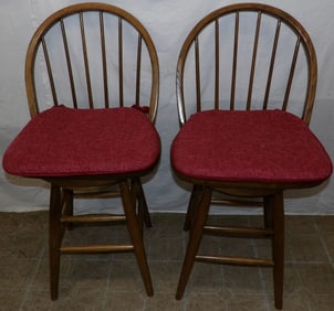 pair of oak swivel bar stools