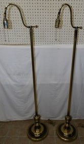pair of gilded metal floor lamps