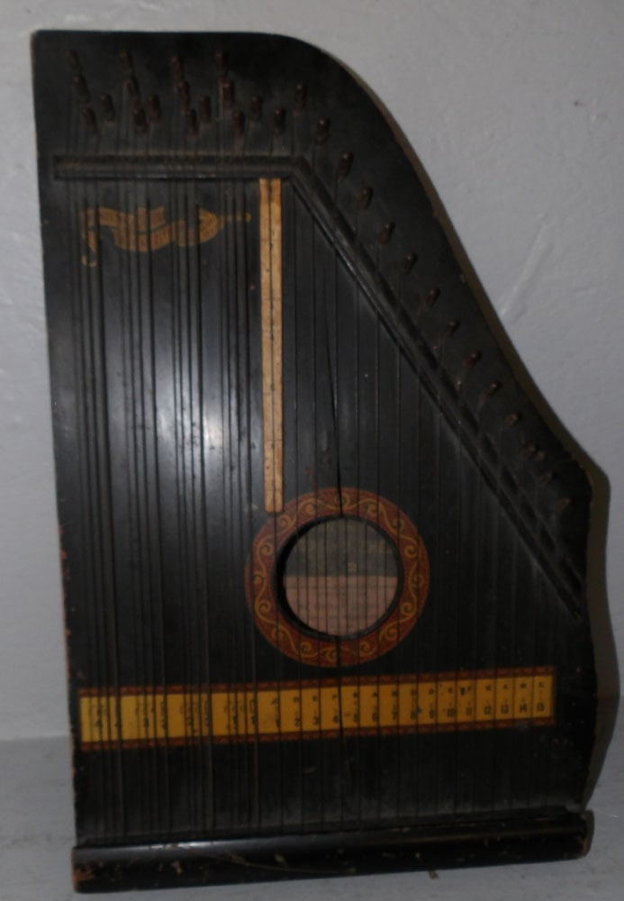 Vintage Menzehauers Guitar Zither: Vintage Menzehauers Guitar Zither. 19 1/4" x 13" ALL DESCRIPTIONS AND ANY CONDITION STATEMENT GIVEN BY LANGSTON AUCTION GALLERY ARE STRICTLY OPINIONS AND LANGSTON'S SHALL HAVE NO RESPONSIBILITY FOR ER