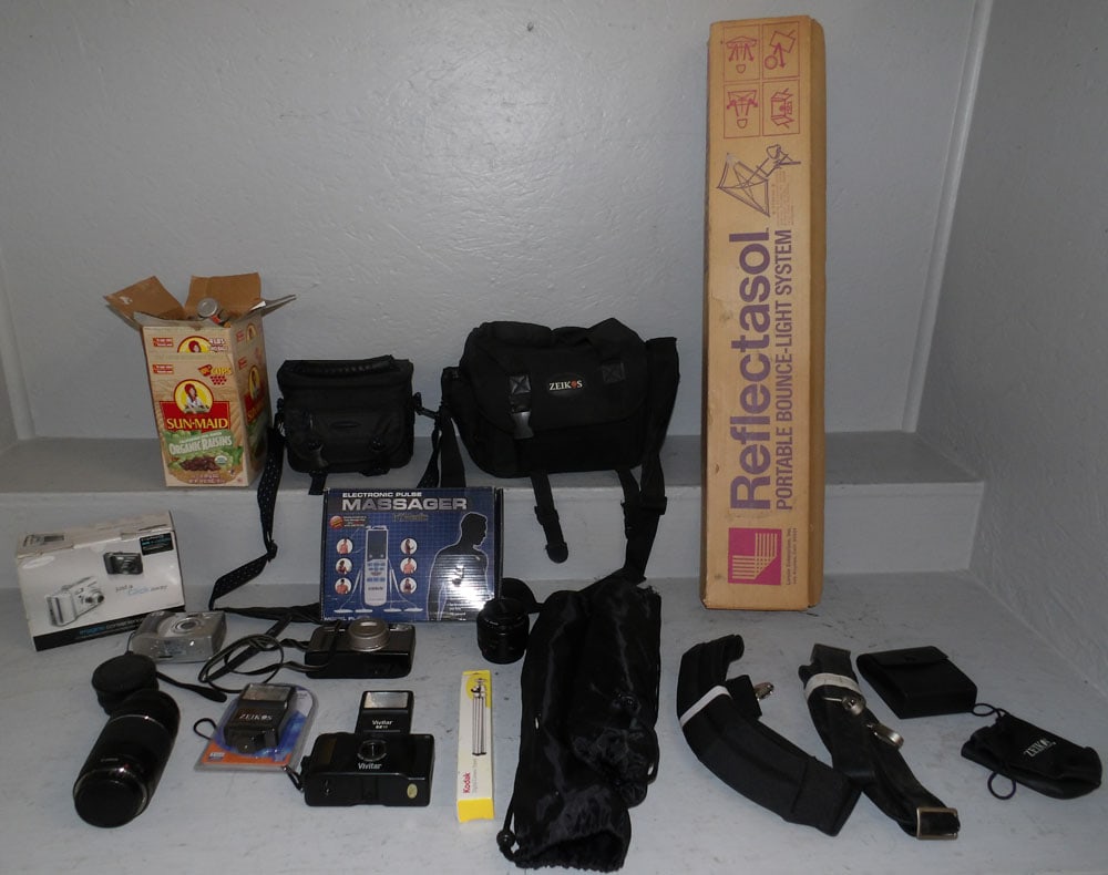 Lot of Vintage Camera & Camera Lenses & Accessories : Lot of Vintage Camera & Camera Lenses & Accessories . Up to 32 1/2" x 6" x 2" ALL DESCRIPTIONS AND ANY CONDITION STATEMENT GIVEN BY LANGSTON AUCTION GALLERY ARE STRICTLY OPINIONS AND LANGSTON'S SHALL