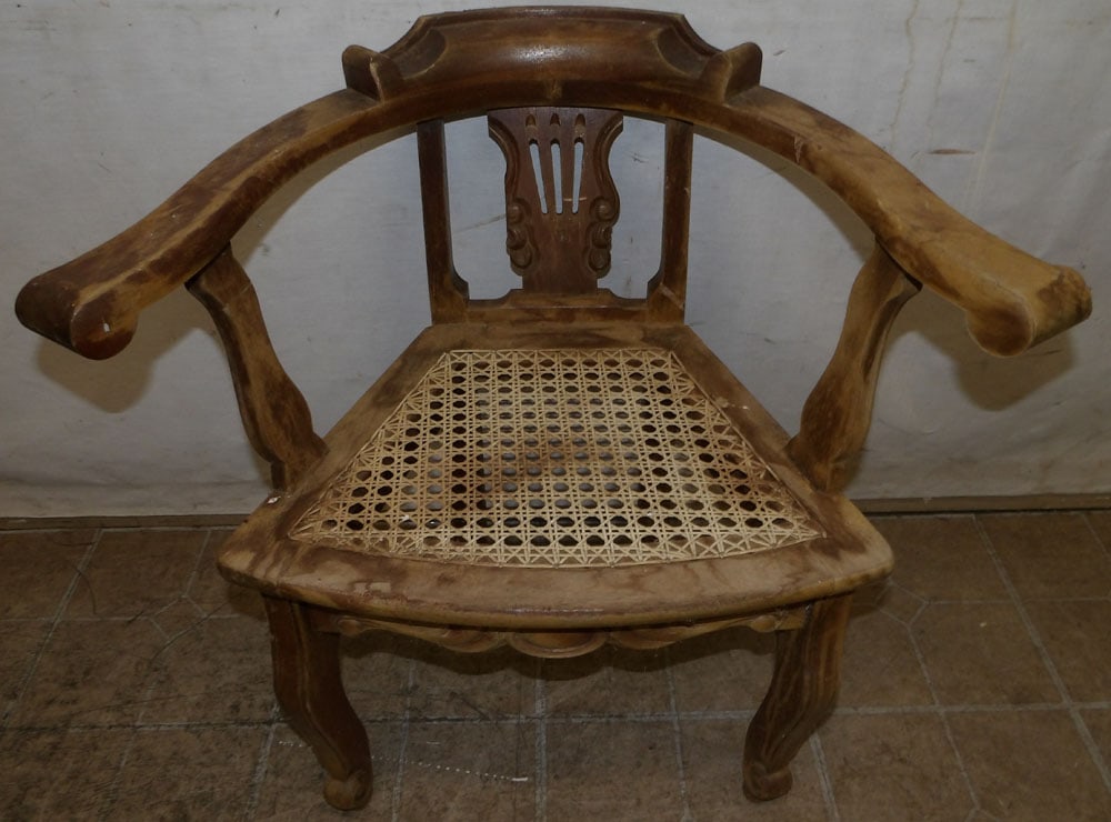 pair of walnut and cane seat arm chairs : pair of walnut and cane seat arm chairs . Up to 27" H 27 1/2" W 18" D ALL DESCRIPTIONS AND ANY CONDITION STATEMENT GIVEN BY LANGSTON AUCTION GALLERY ARE STRICTLY OPINIONS AND LANGSTON'S SHALL HAVE NO 