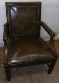 leather upholstered and mahogany arm chair