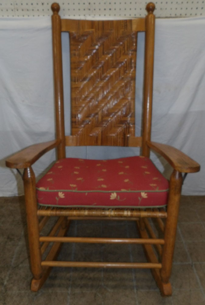 Antique Oak & Rattan Rocker : Antique Oak & Rattan Rocker . 45 1/2" H 28" W 31 1/2" D ALL DESCRIPTIONS AND ANY CONDITION STATEMENT GIVEN BY LANGSTON AUCTION GALLERY ARE STRICTLY OPINIONS AND LANGSTON'S SHALL HAVE NO RESPONSIBILITY