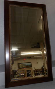 Mahogany Framed Bevel Edge Mirror : Mahogany Framed Bevel Edge Mirror . 40 1/2" x 22 1/4" ALL DESCRIPTIONS AND ANY CONDITION STATEMENT GIVEN BY LANGSTON AUCTION GALLERY ARE STRICTLY OPINIONS AND LANGSTON'S SHALL HAVE NO RESPONSIBILITY F
