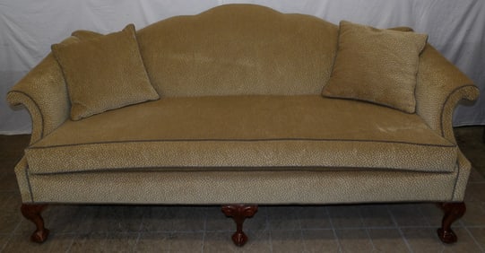Carved Mahogany Upholstered Camel Back Sofa with Ball & Claw Feet