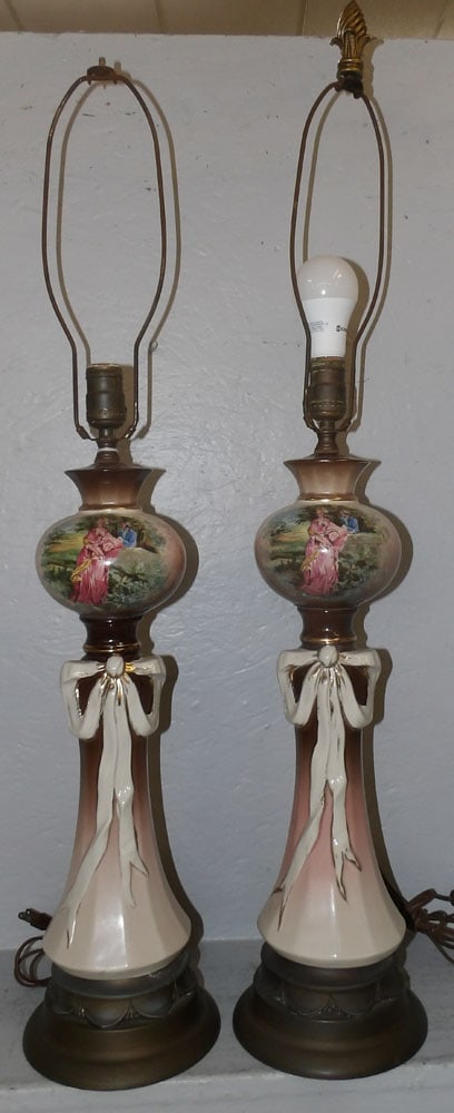 Two Painted Porcelain Lamps : Two Painted Porcelain Lamps . 36 1/2" H 7" Dia. ALL DESCRIPTIONS AND ANY CONDITION STATEMENT GIVEN BY LANGSTON AUCTION GALLERY ARE STRICTLY OPINIONS AND LANGSTON'S SHALL HAVE NO RESPONSIBILITY FOR ERR