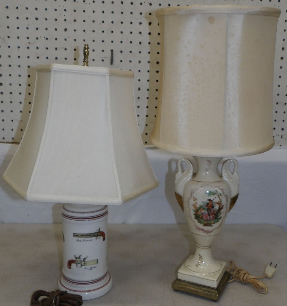Two Painted Porcelain Lamps : Two Painted Porcelain Lamps . Up to 22 1/2" H 10" Dia. ALL DESCRIPTIONS AND ANY CONDITION STATEMENT GIVEN BY LANGSTON AUCTION GALLERY ARE STRICTLY OPINIONS AND LANGSTON'S SHALL HAVE NO RESPONSIBILITY 