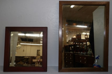 2 mahogany framed mirrors
