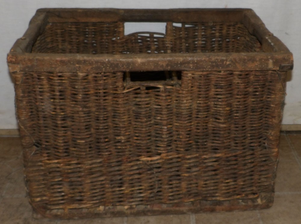 antique wicker crate: antique wicker crate. 15 1/4" H 21 3/4" W 14 1/2" D ALL DESCRIPTIONS AND ANY CONDITION STATEMENT GIVEN BY LANGSTON AUCTION GALLERY ARE STRICTLY OPINIONS AND LANGSTON'S SHALL HAVE NO RESPONSIBILITY FOR