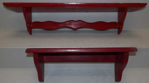 2 painted wooden shelves