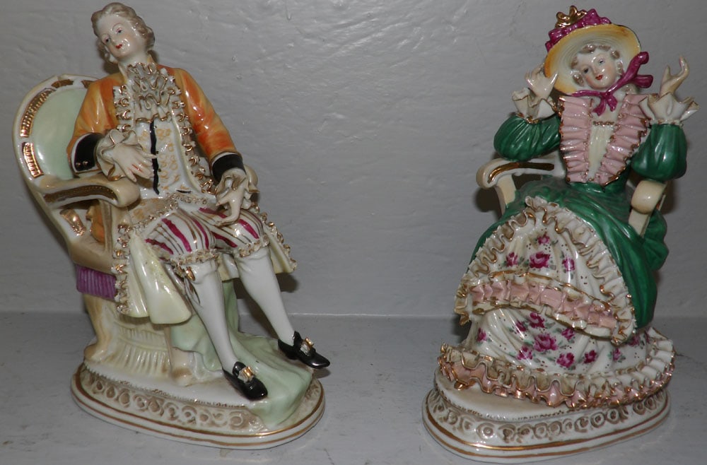 2 painted porcelain figures : 2 painted porcelain figures . Up to 10" H 7" W 3" D ALL DESCRIPTIONS AND ANY CONDITION STATEMENT GIVEN BY LANGSTON AUCTION GALLERY ARE STRICTLY OPINIONS AND LANGSTON'S SHALL HAVE NO RESPONSIBILITY FOR