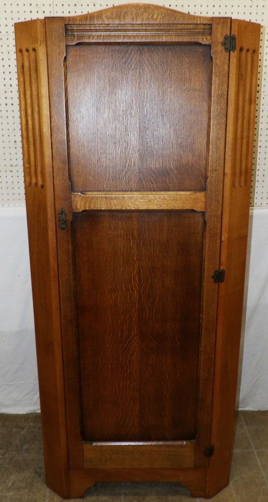 antique oak wardrobe : antique oak wardrobe . 70 3/4" H 31" W 17" D ALL DESCRIPTIONS AND ANY CONDITION STATEMENT GIVEN BY LANGSTON AUCTION GALLERY ARE STRICTLY OPINIONS AND LANGSTON'S SHALL HAVE NO RESPONSIBILITY FOR ERRORS