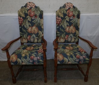 pair of chestnut and tapestry upholstered high back arm chairs