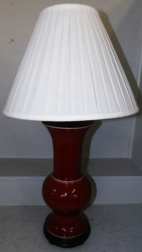 Oriental Ox Blood Porcelain Lamp: Oriental Ox Blood Porcelain Lamp. 31 1/2" H 17" Dia.
