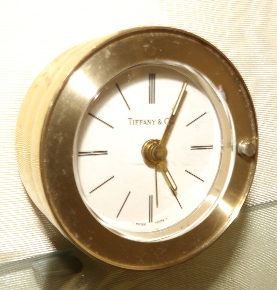 Brass Travel Clock by Tiffany & Co.: Brass Travel Clock by Tiffany & Co.. 2 1/2" H 1 1/2" Dia.