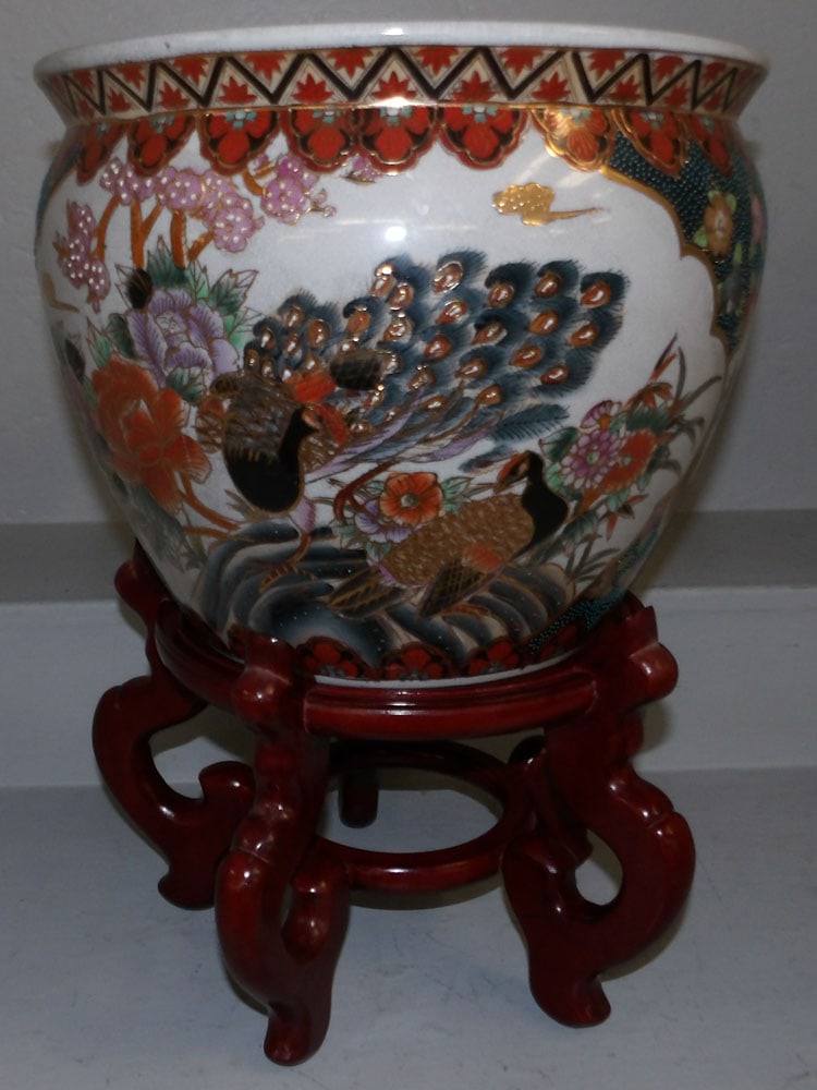 Painted Oriental Porcelain Jardiniere on Teakwood Stand : Painted Oriental Porcelain Jardiniere on Teakwood Stand . 20" H 14 1/2" Dia.