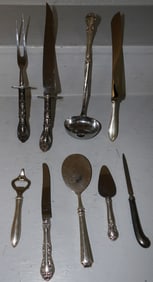 Nine Sterling Handled Items
