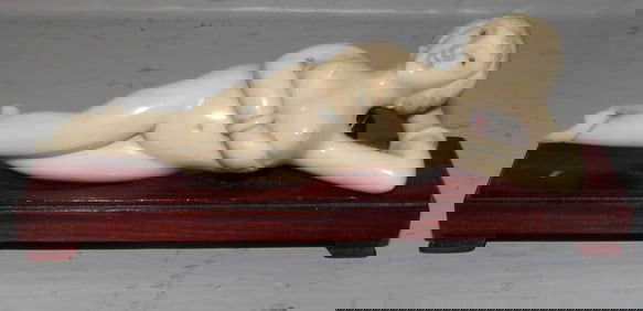 Carved Bone Nude Woman on Teakwood Stand