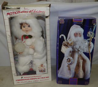 Two Santa Claus Dolls